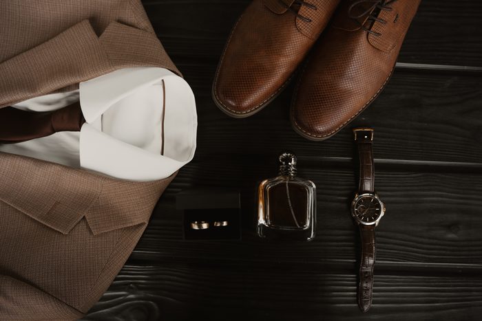 Wedding shoes, rings and a white bridal bouquet