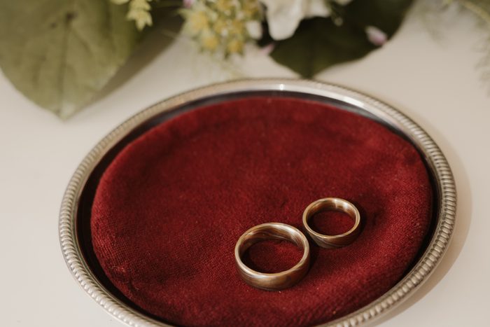Wedding rings on red velvet