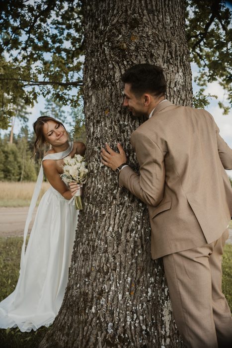 Wedding guests congratulating the couple outdoors