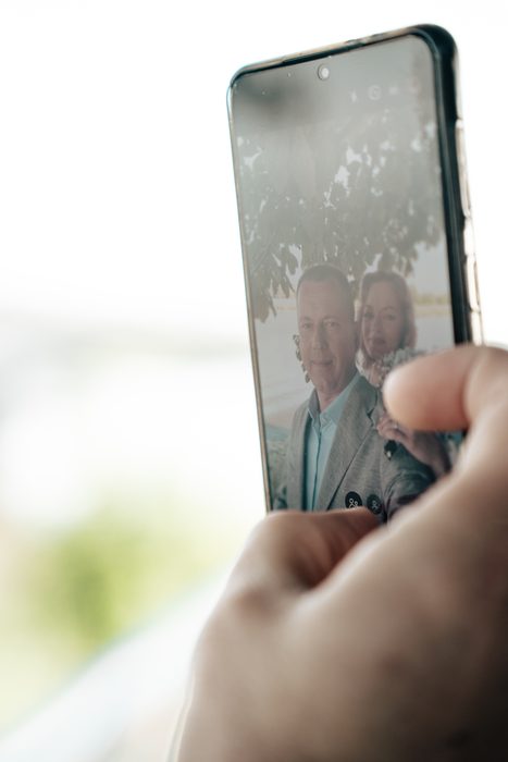 Wedding couple on a phone screen